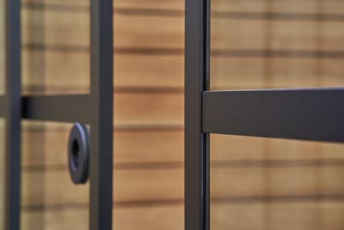 Håndtag i sort rustfrit stål – rundt design til glasvæg (sæt med 2 stk.)